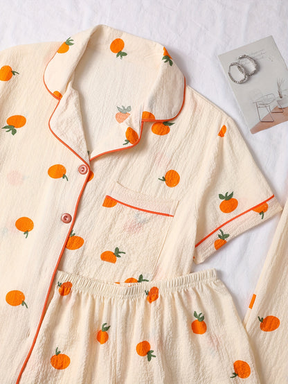 Tredelad pyjamas i mjukt tyg med lekfullt tryck med Apelsin