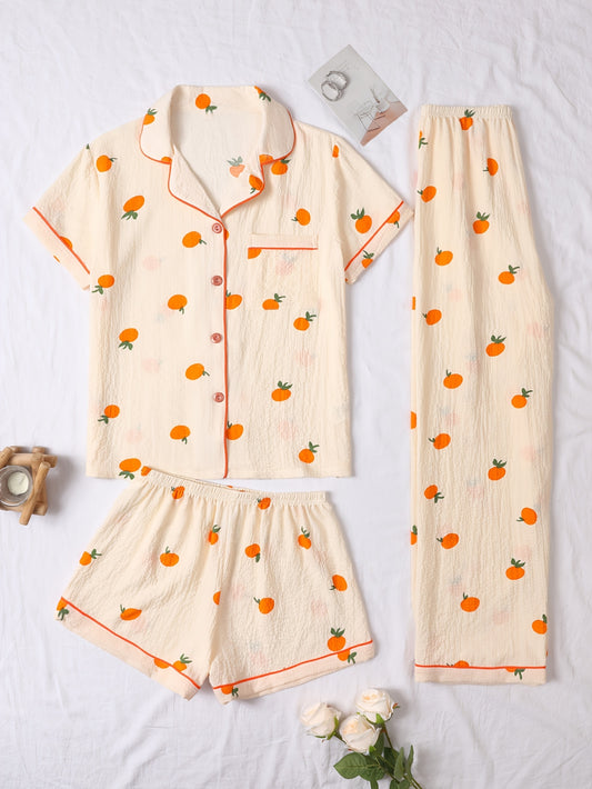 Tredelad pyjamas i mjukt tyg med lekfullt tryck med Apelsin